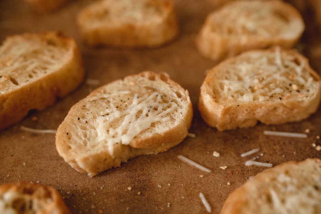 crusty bread with a pepper and cheese sprinkle